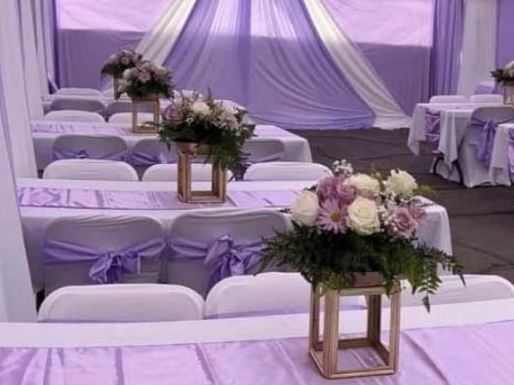 White tablecloths with lavender runners